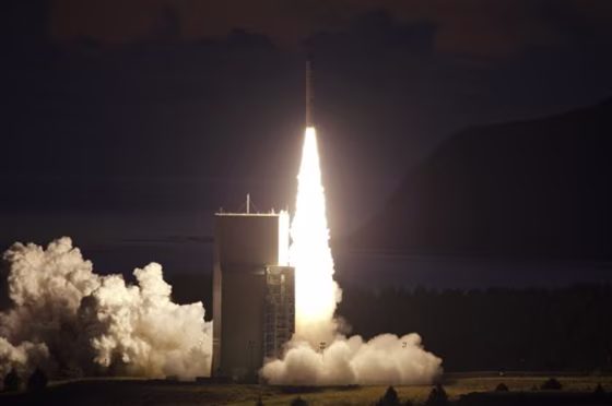A rocket lifts off from the Alaskan Aerospace Corp.'s Kodiak Launch Complex in Alaska on Tuesday,&nbsp;carrying an experimental Navy communications satellite designed for safer combat communications.